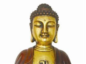  明宣德铜鎏金释迦牟尼佛 高32厘米，重4公斤  明永乐释迦牟尼坐像 2006年亮相香港苏富比 